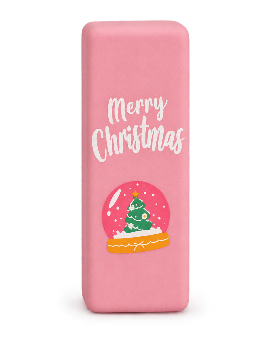 Soft pink Christmas squishy brick with a snow globe and Merry Christmas print, standing upright