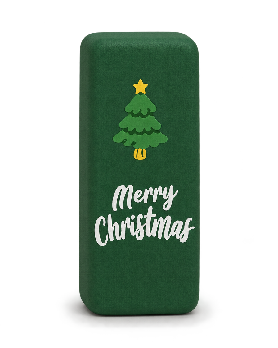 Forest green Christmas squishy brick with a Christmas tree and Merry Christmas print, standing upright